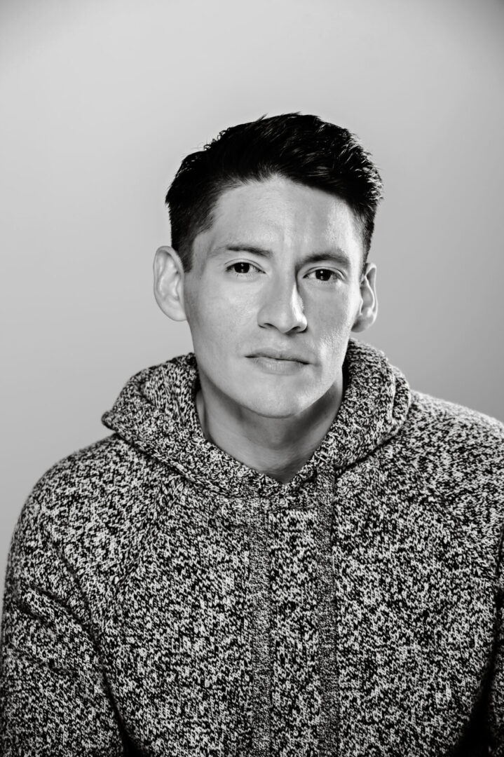 Man in a knitted sweater, monochrome portrait