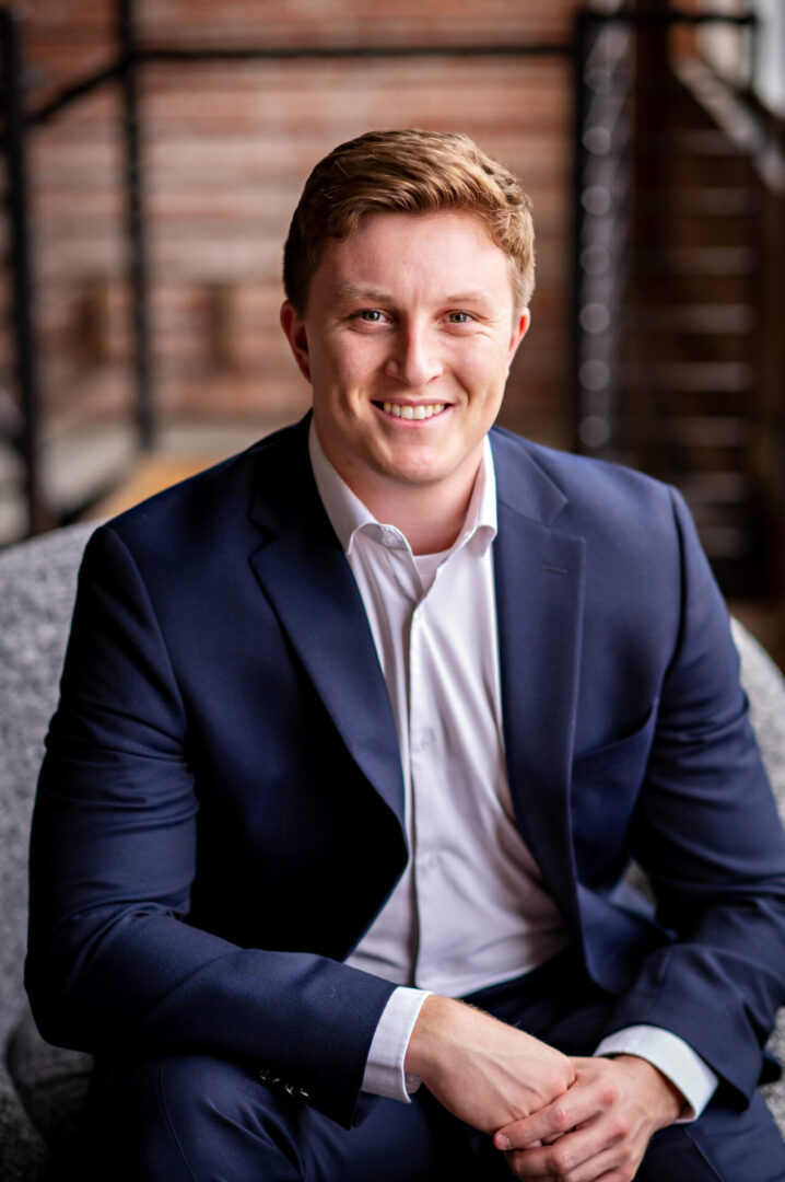 Confident businessperson seated indoors